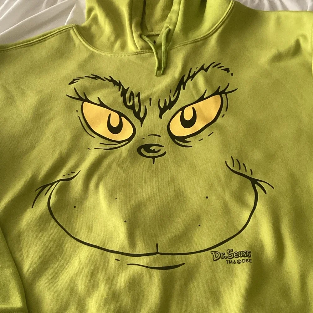 Dr. Seuss Lime Green Grinch Face Hoodie with Yellow Eyes
